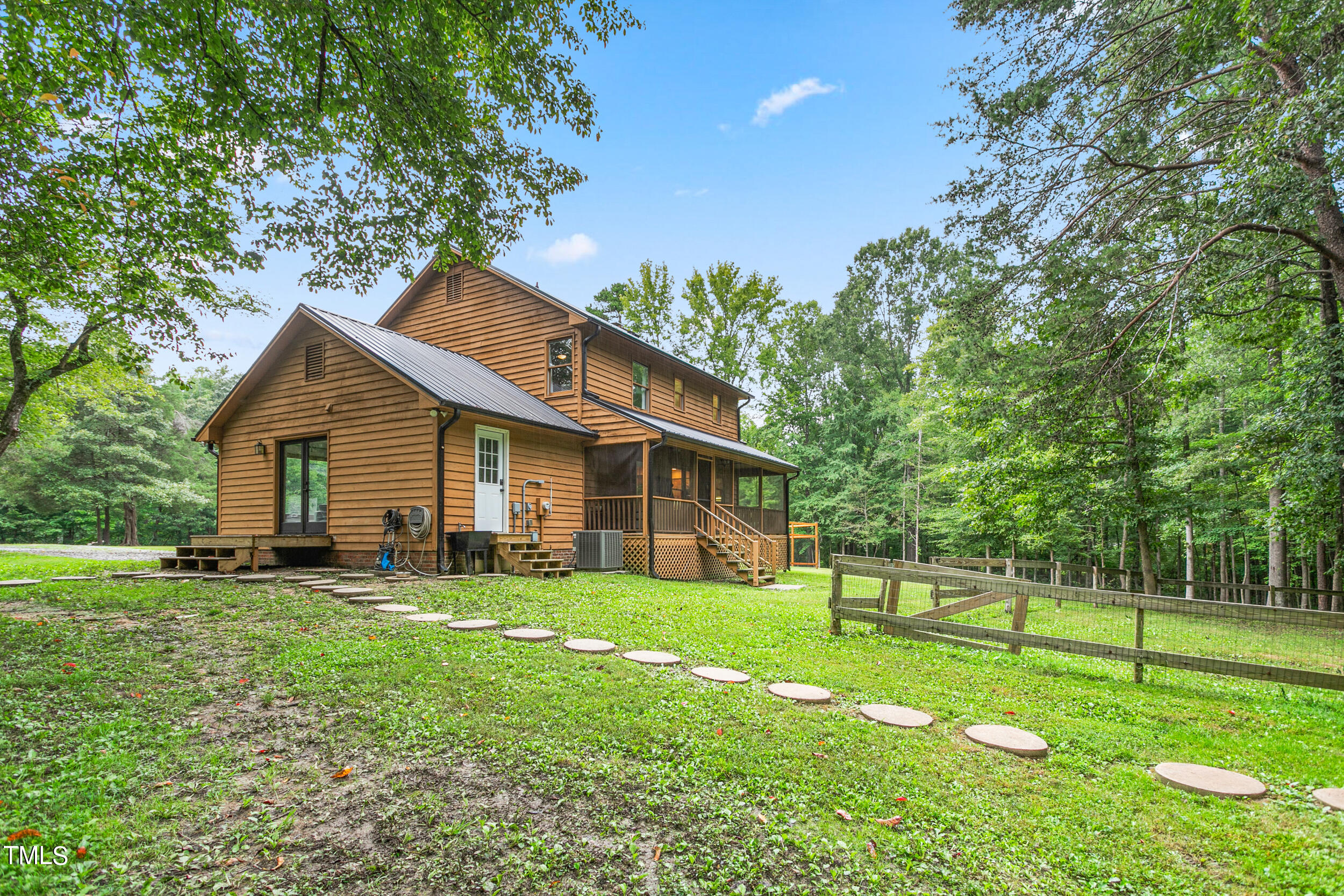 8801 Highway 157 Rougemont, NC 27572 - Photo 36 of 60 a view of a house with a yard