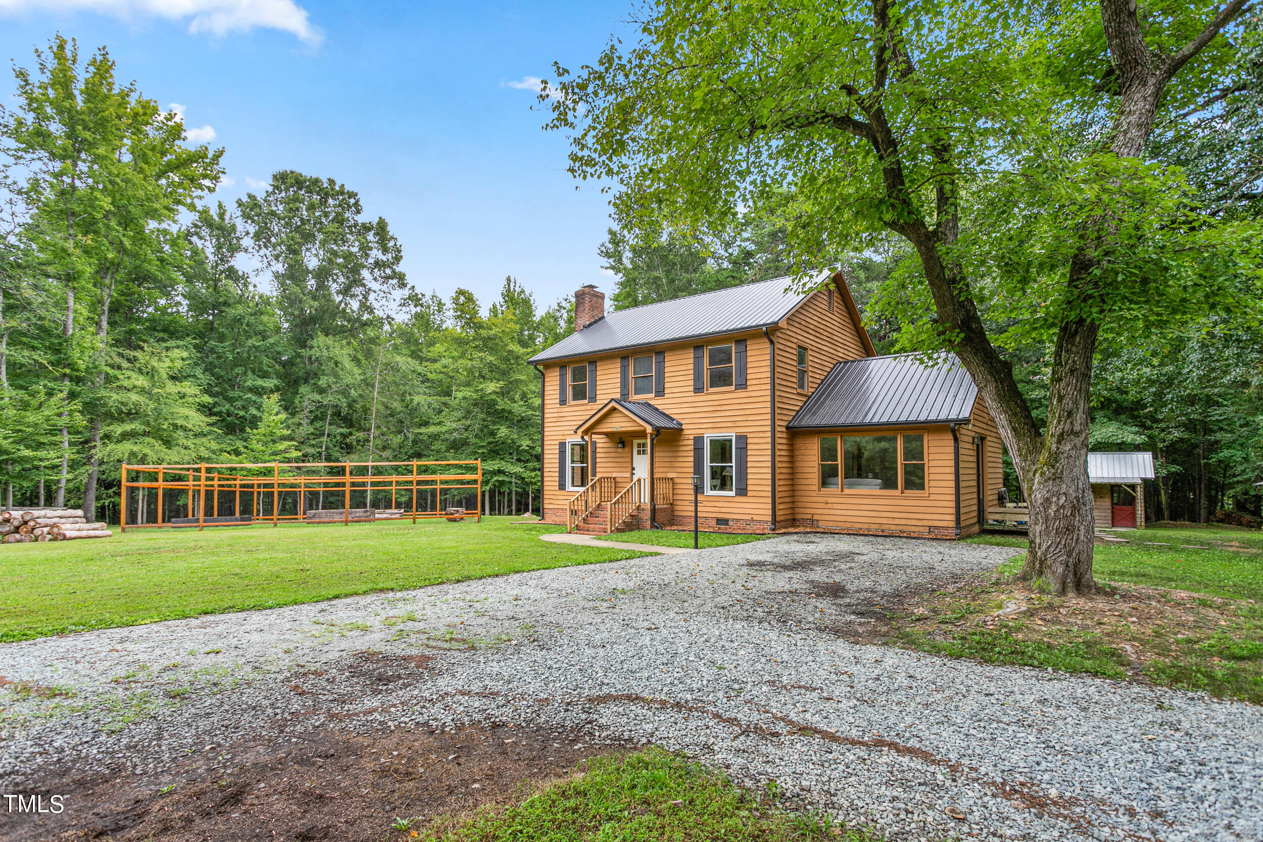 8801 Highway 157 Rougemont, NC 27572 - Photo 4 of 60 front view of a house with a yard