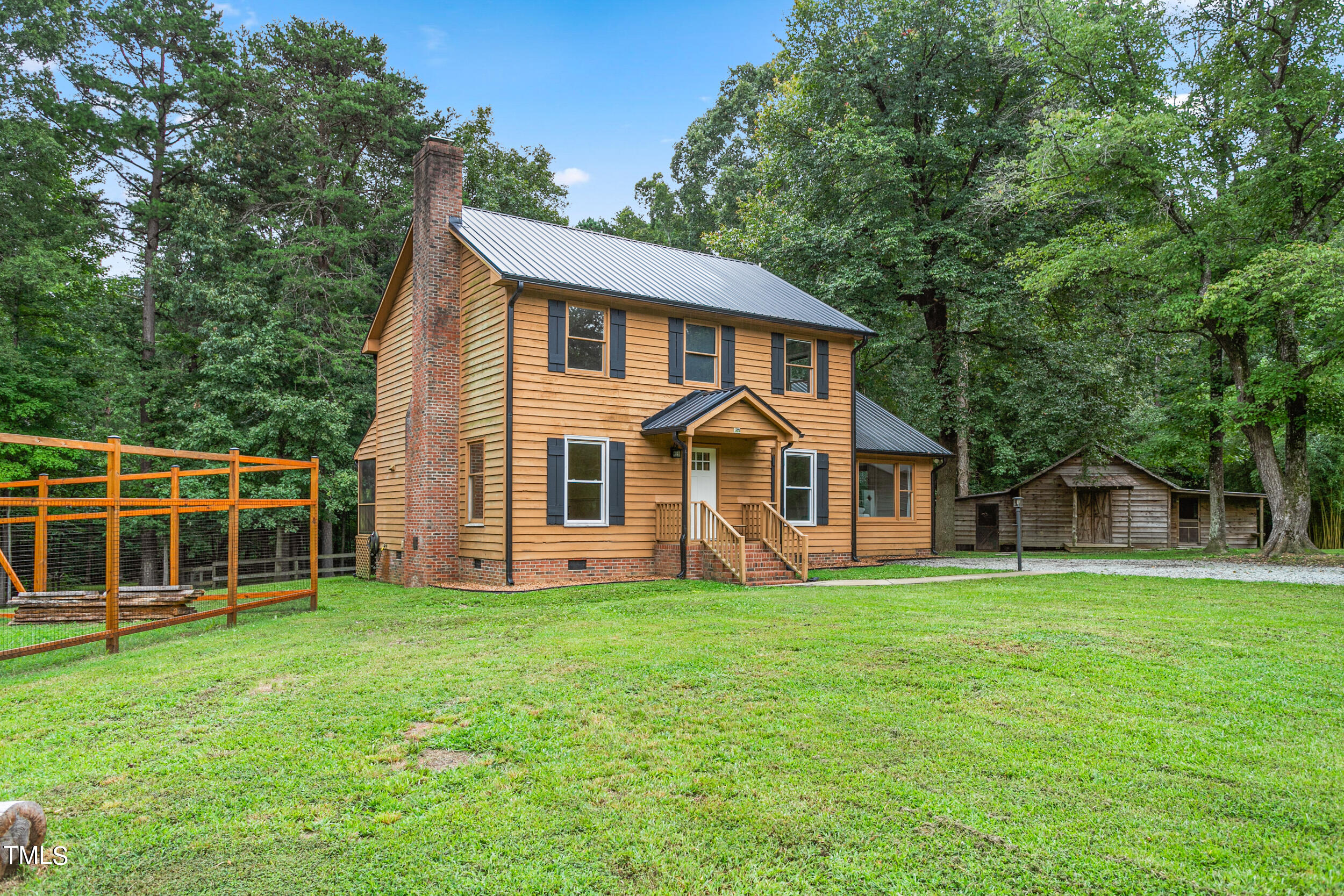 8801 Highway 157 Rougemont, NC 27572 - Photo 59 of 60 a view of a house with a yard