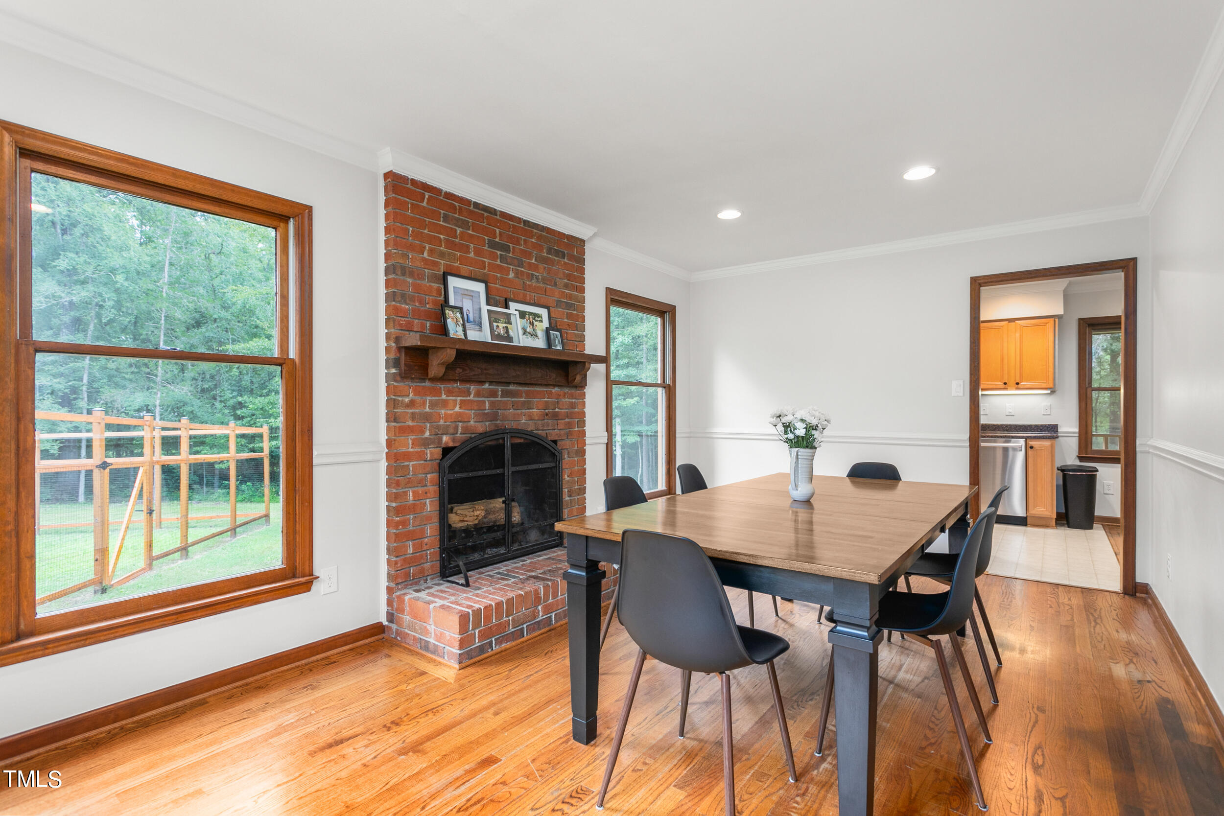 8801 Highway 157 Rougemont, NC 27572 - Photo 7 of 60 a view of a dining room with furniture window and wooden floor