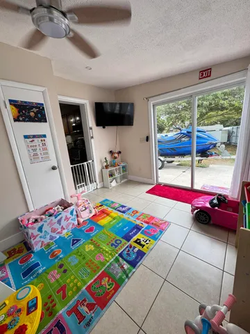 a room with furniture and a wooden floor