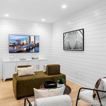 5142 Teaberry Lane, Unit 18 Fishkill, NY 12524 - Photo 9 of 9 a living room with furniture and a painting on the wall