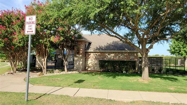 a view of a backyard with sitting area and furniture