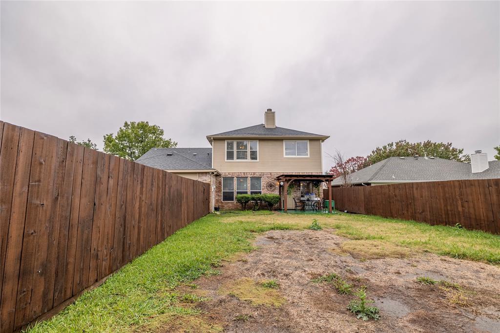3103 Scott Drive Sachse, TX 75048 - Photo 24 of 26 a view of a big house with a big yard and large trees
