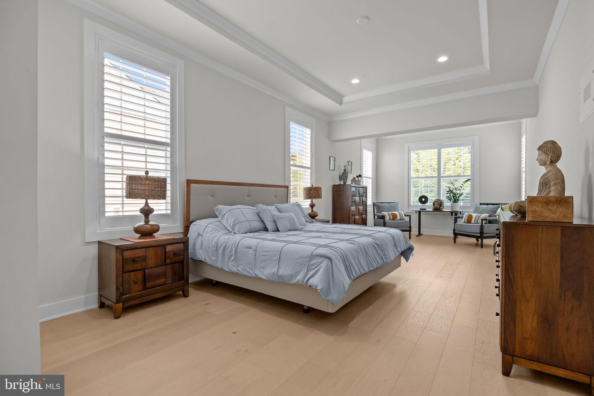 164 Tyler Way Yardley, PA 19067 - Photo 12 of 34 a spacious bedroom with a bed and a couch