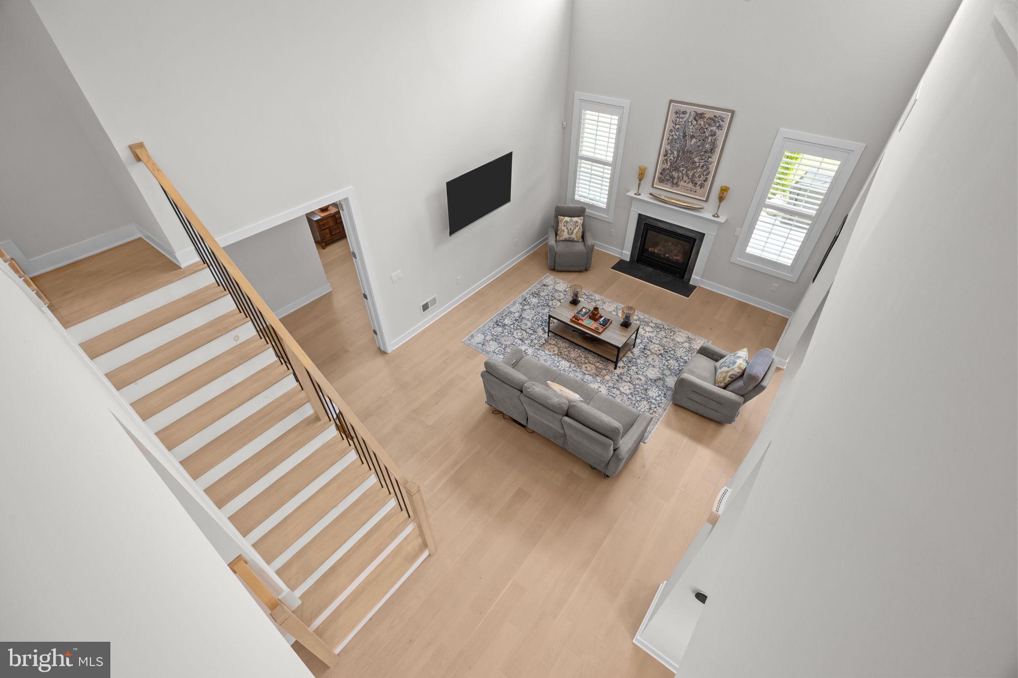 164 Tyler Way Yardley, PA 19067 - Photo 23 of 34 a living room with furniture and a fireplace