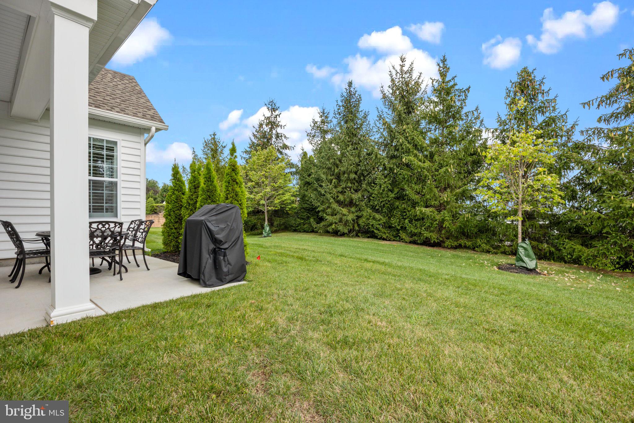 164 Tyler Way Yardley, PA 19067 - Photo 25 of 34 a view of a backyard with a patio