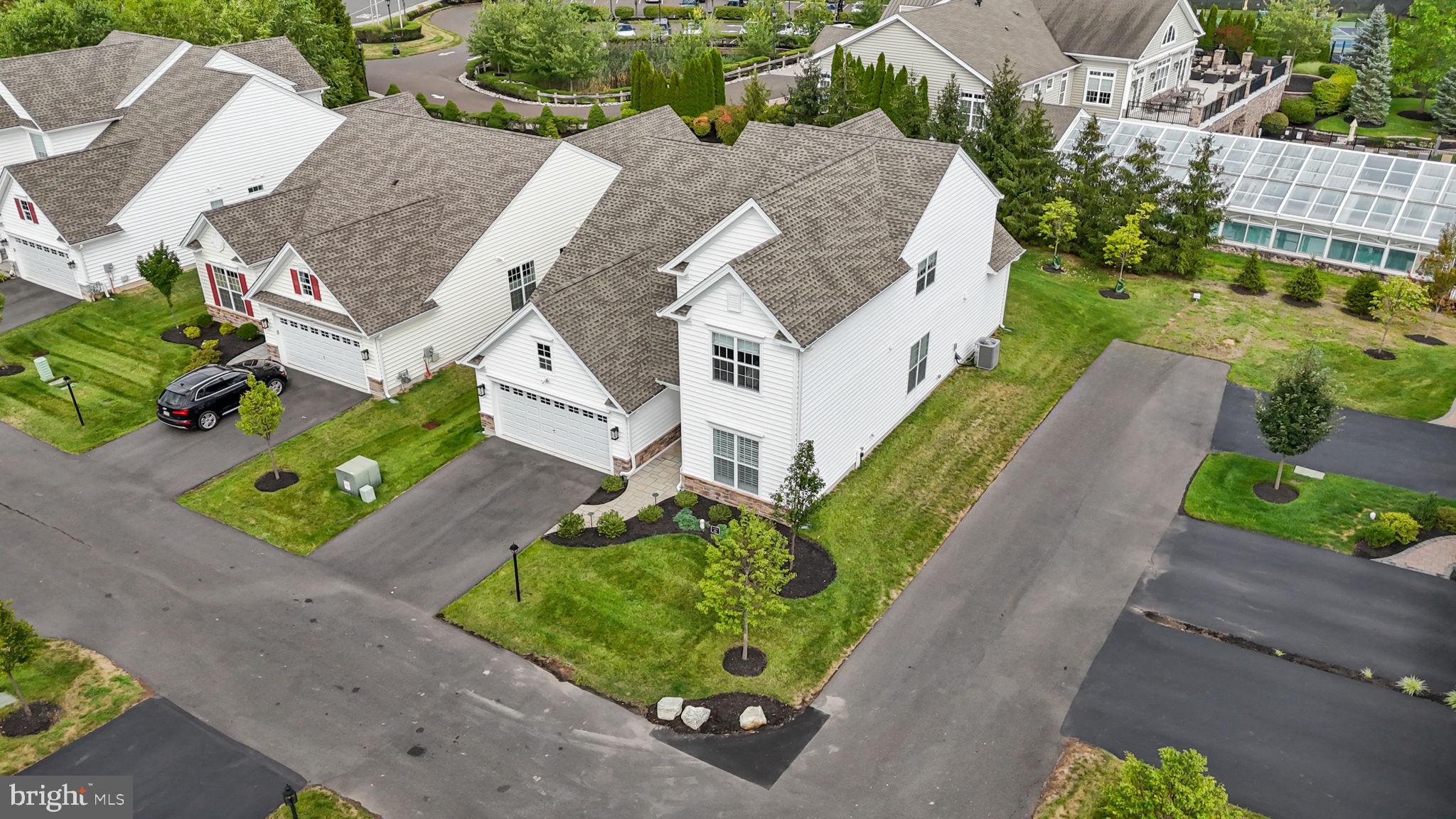 164 Tyler Way Yardley, PA 19067 - Photo 28 of 34 an aerial view of a house with a yard and garden