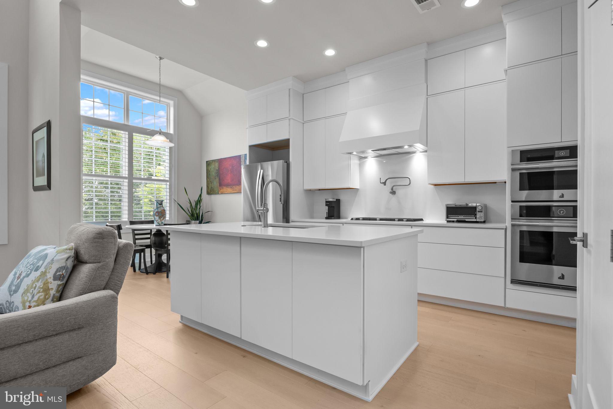 164 Tyler Way Yardley, PA 19067 - Photo 8 of 34 a kitchen with counter top space cabinets and stainless steel appliances