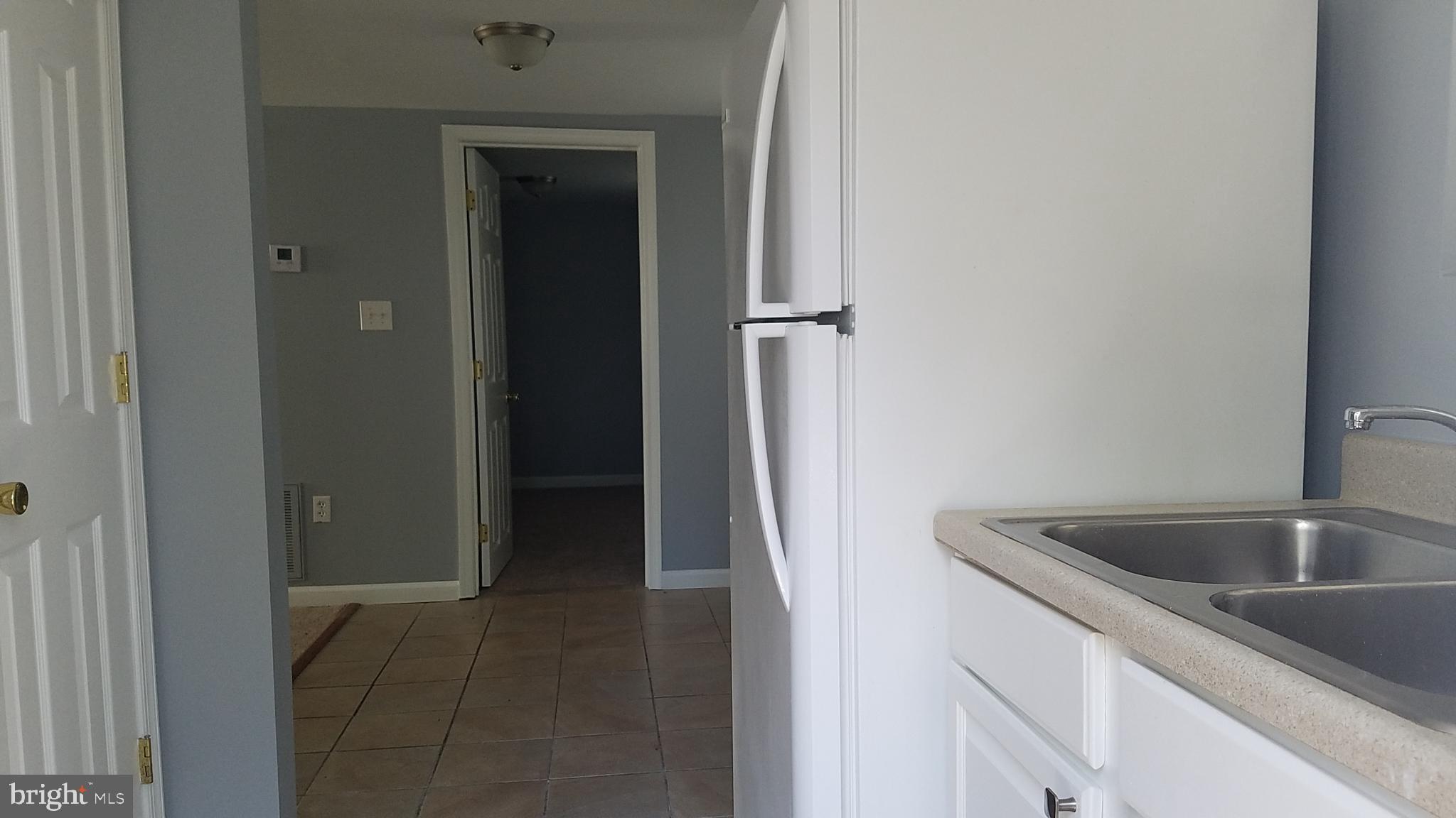 17746 Possum Point Road Dumfries, VA 22026 - Photo 18 of 25 View of DR from kitchen Unit B