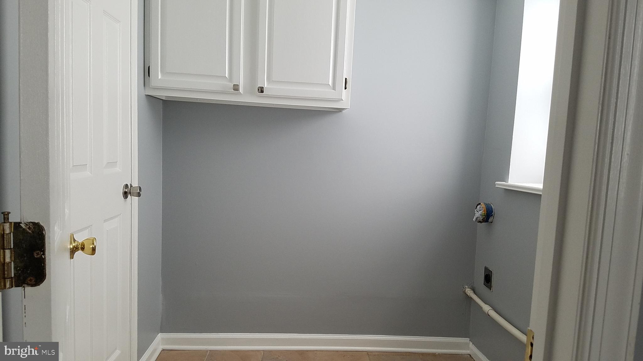 17746 Possum Point Road Dumfries, VA 22026 - Photo 22 of 25 Laundry room Unit B