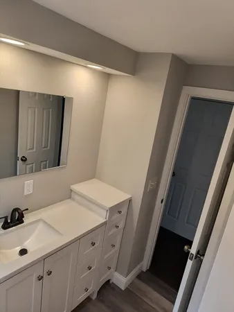 an empty room with a fireplace