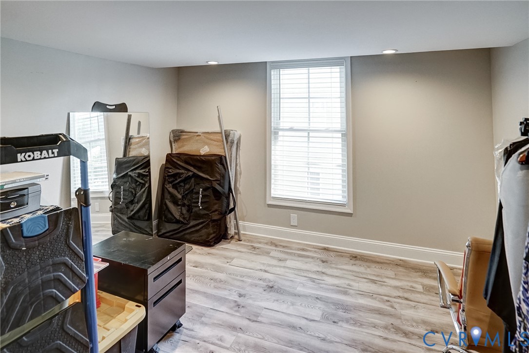 4669 Woburn Road Providence Forge, VA 23140 - Photo 55 of 78 a bedroom with furniture and a flat screen tv