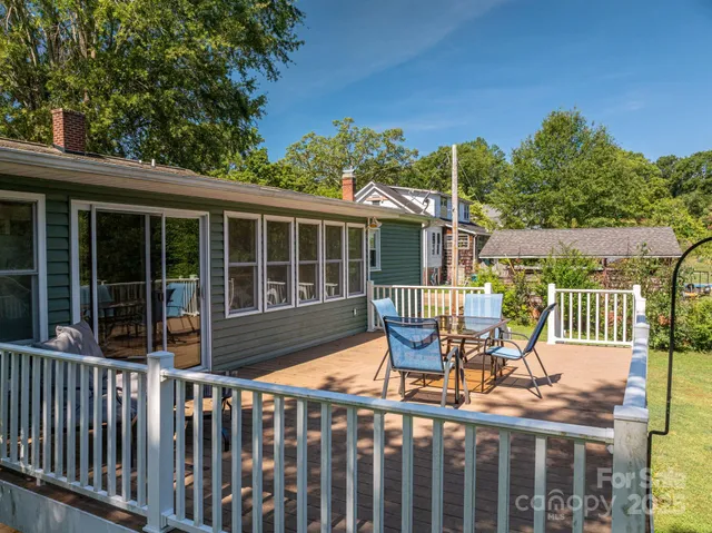 a balcony view with a seating space