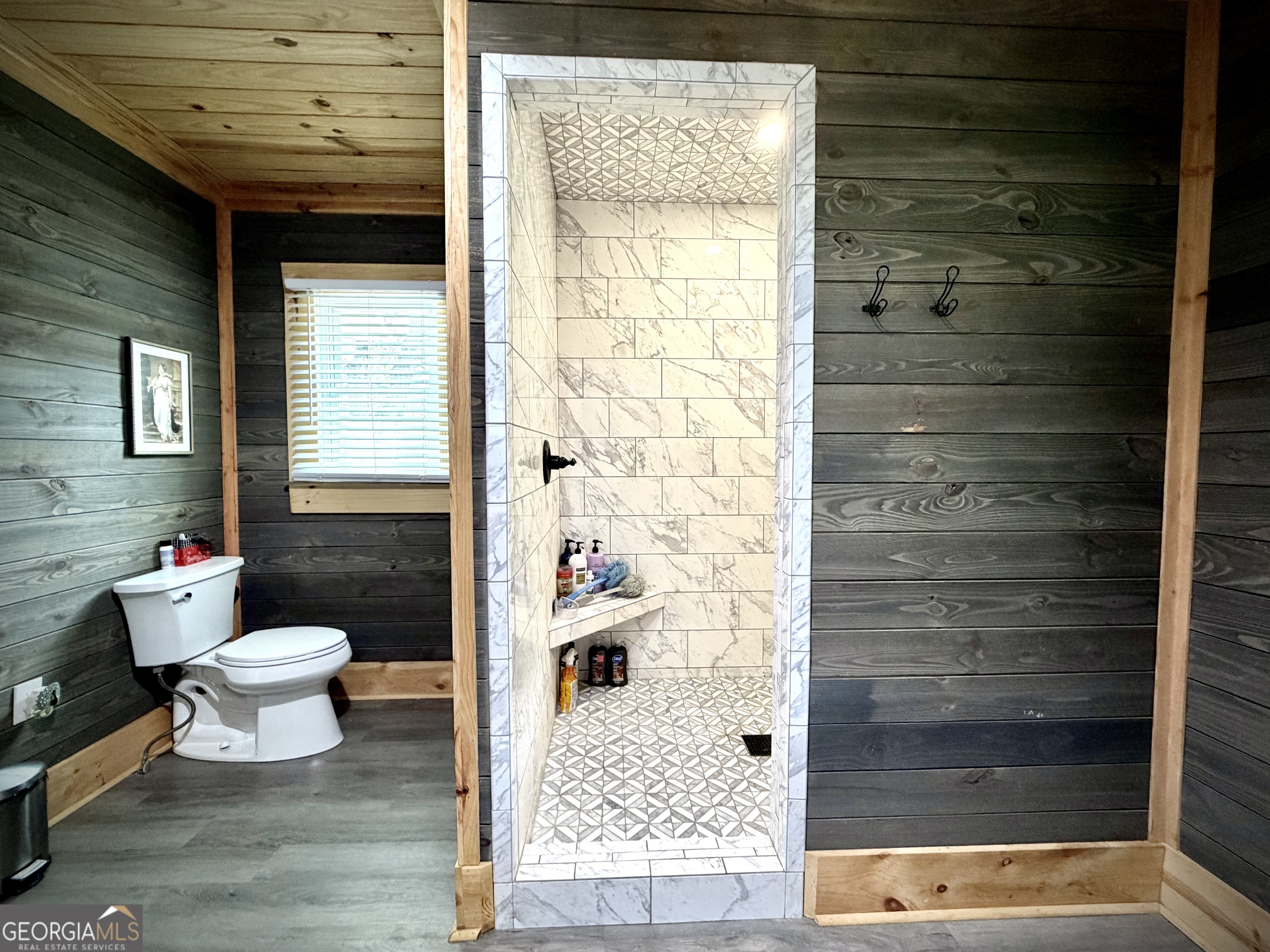629 Bobby Fortner Road Kite, GA 31049 - Photo 22 of 63 a bathroom with a toilet and shower