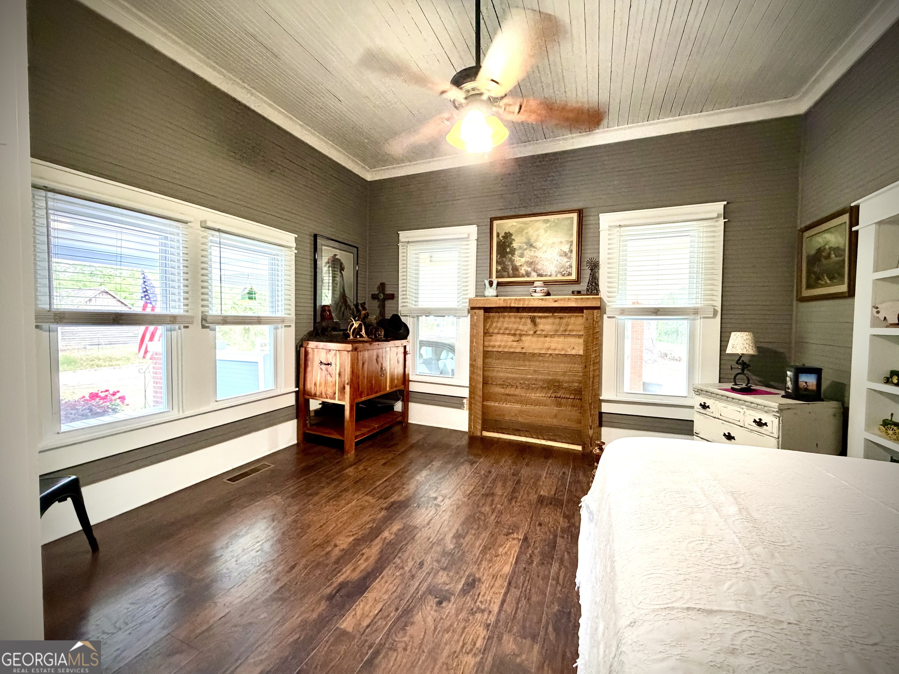 629 Bobby Fortner Road Kite, GA 31049 - Photo 26 of 63 a bedroom with furniture and a large window