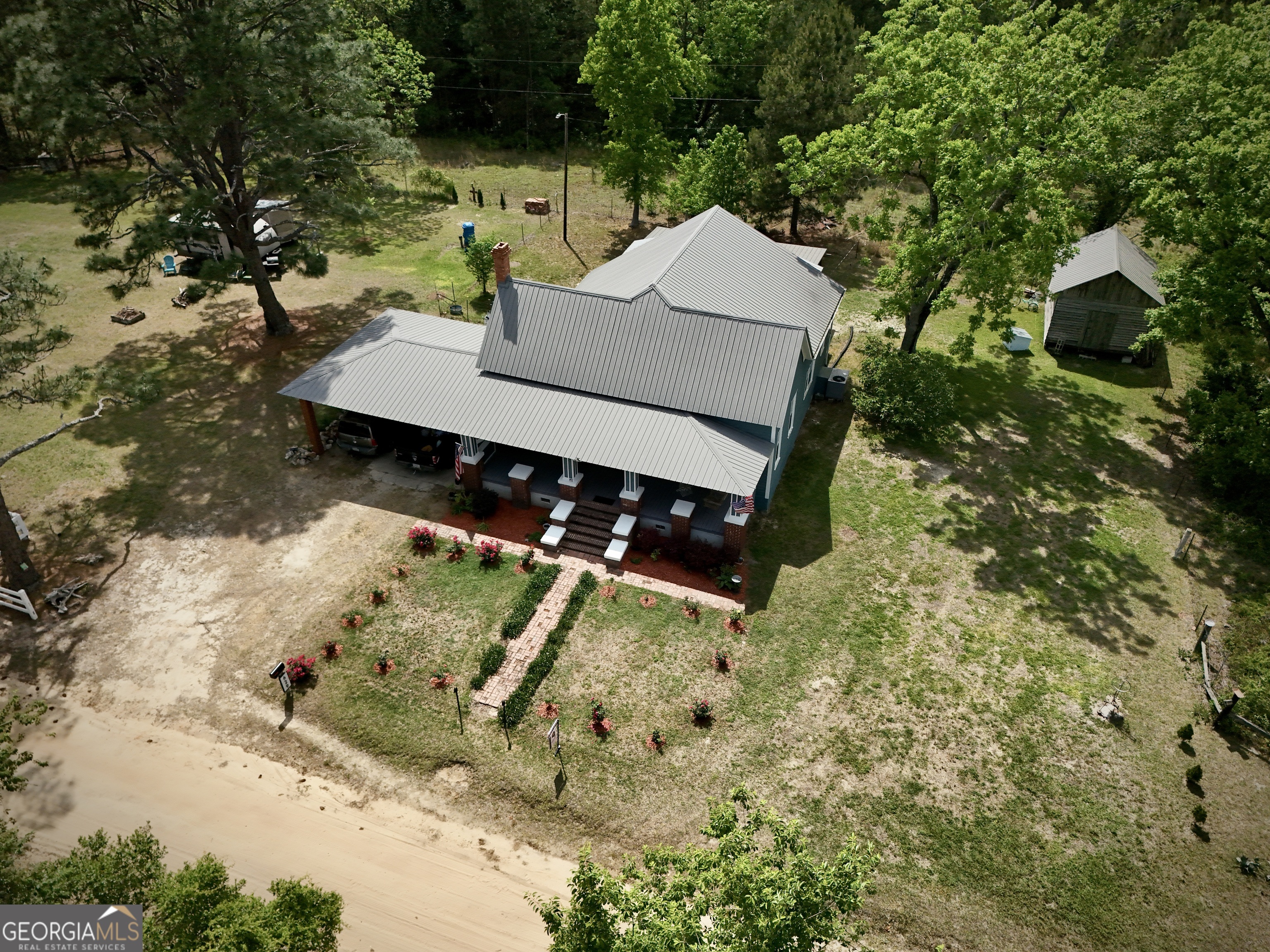 629 Bobby Fortner Road Kite, GA 31049 - Photo 3 of 63 a view of a backyard of the house