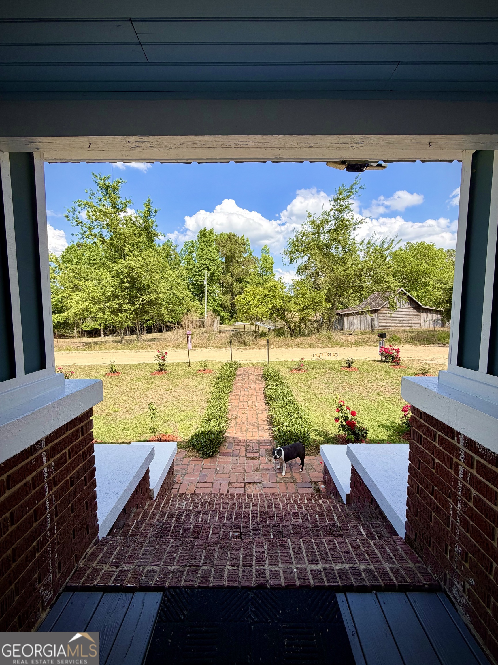 629 Bobby Fortner Road Kite, GA 31049 - Photo 40 of 63 a view of a patio with wooden floor and outdoor space