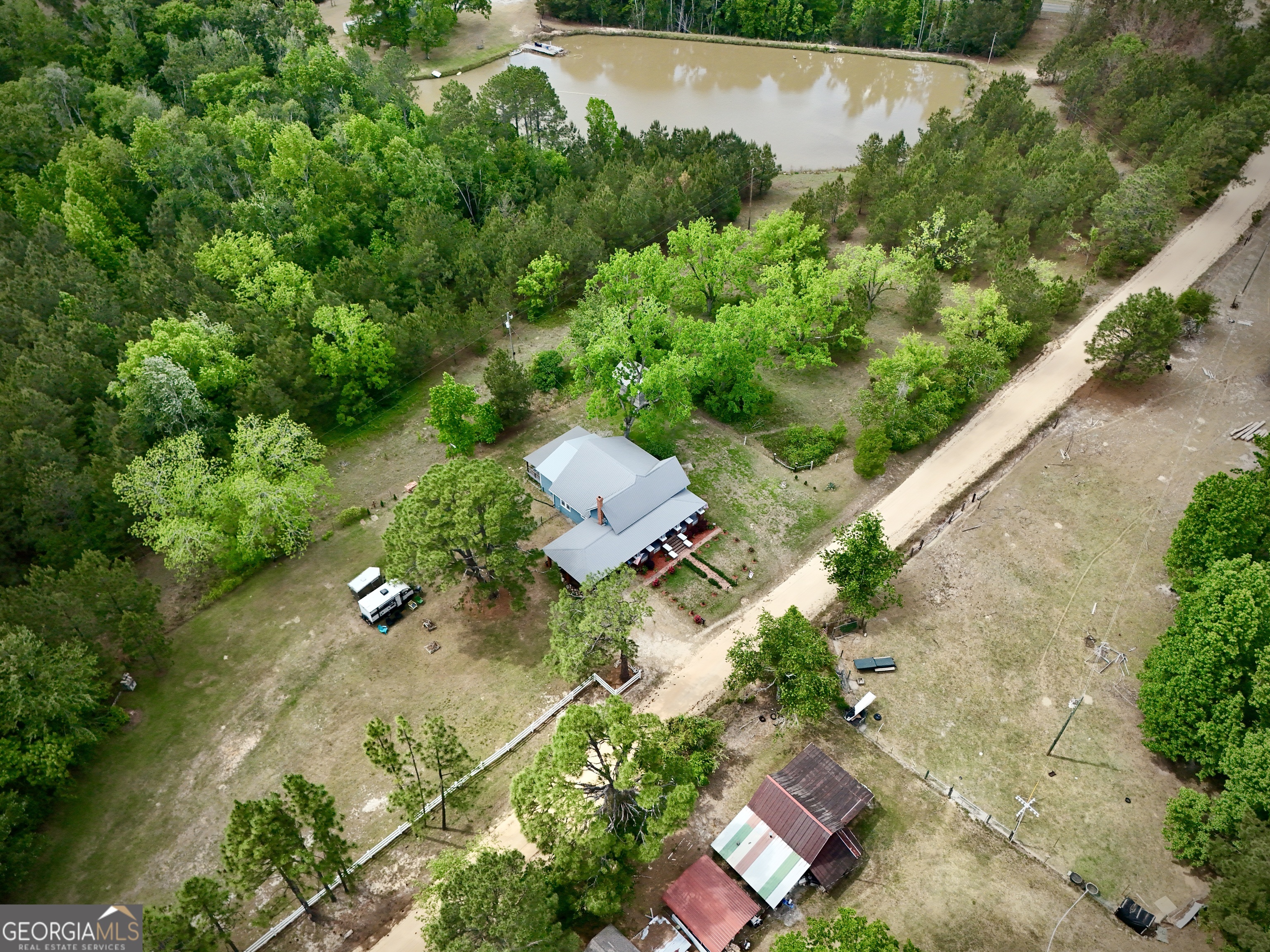 629 Bobby Fortner Road Kite, GA 31049 - Photo 51 of 63 an aerial view of a house with a yard