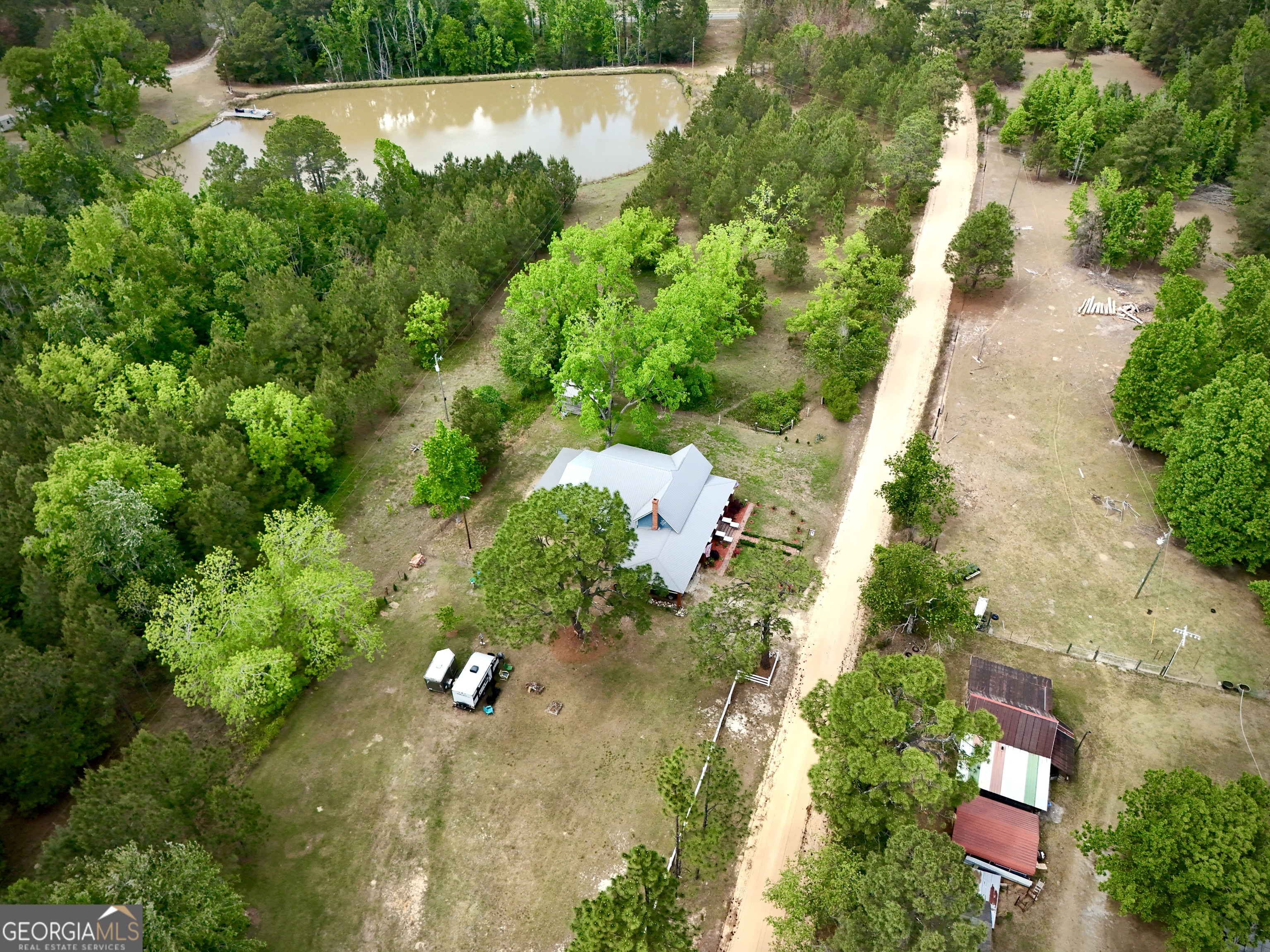 629 Bobby Fortner Road Kite, GA 31049 - Photo 55 of 63 an aerial view of a house with a yard and garden