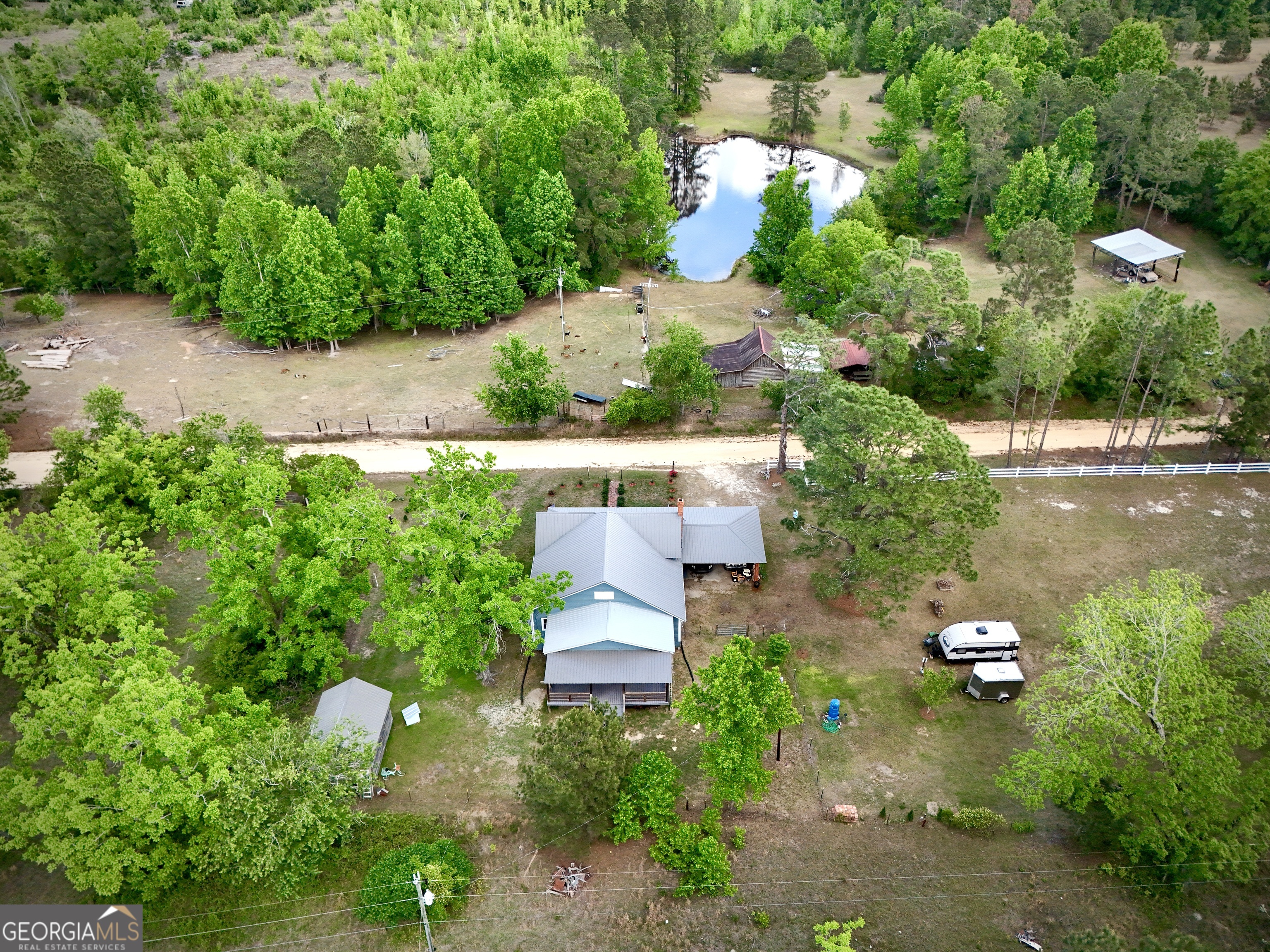 629 Bobby Fortner Road Kite, GA 31049 - Photo 57 of 63 an aerial view of a house with garden space and street view