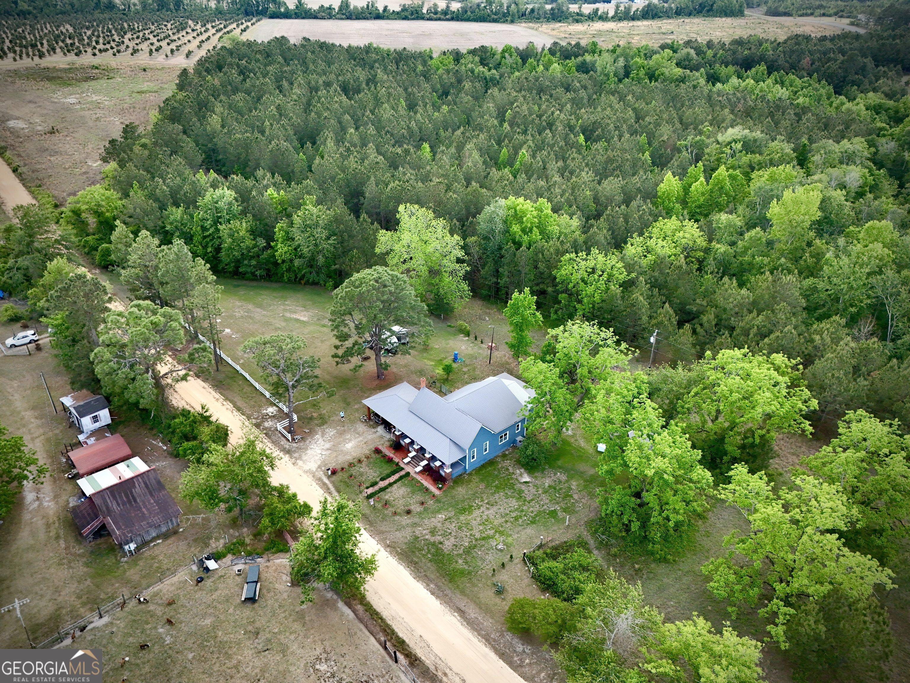 629 Bobby Fortner Road Kite, GA 31049 - Photo 59 of 63 a view of a yard and an outdoor seating