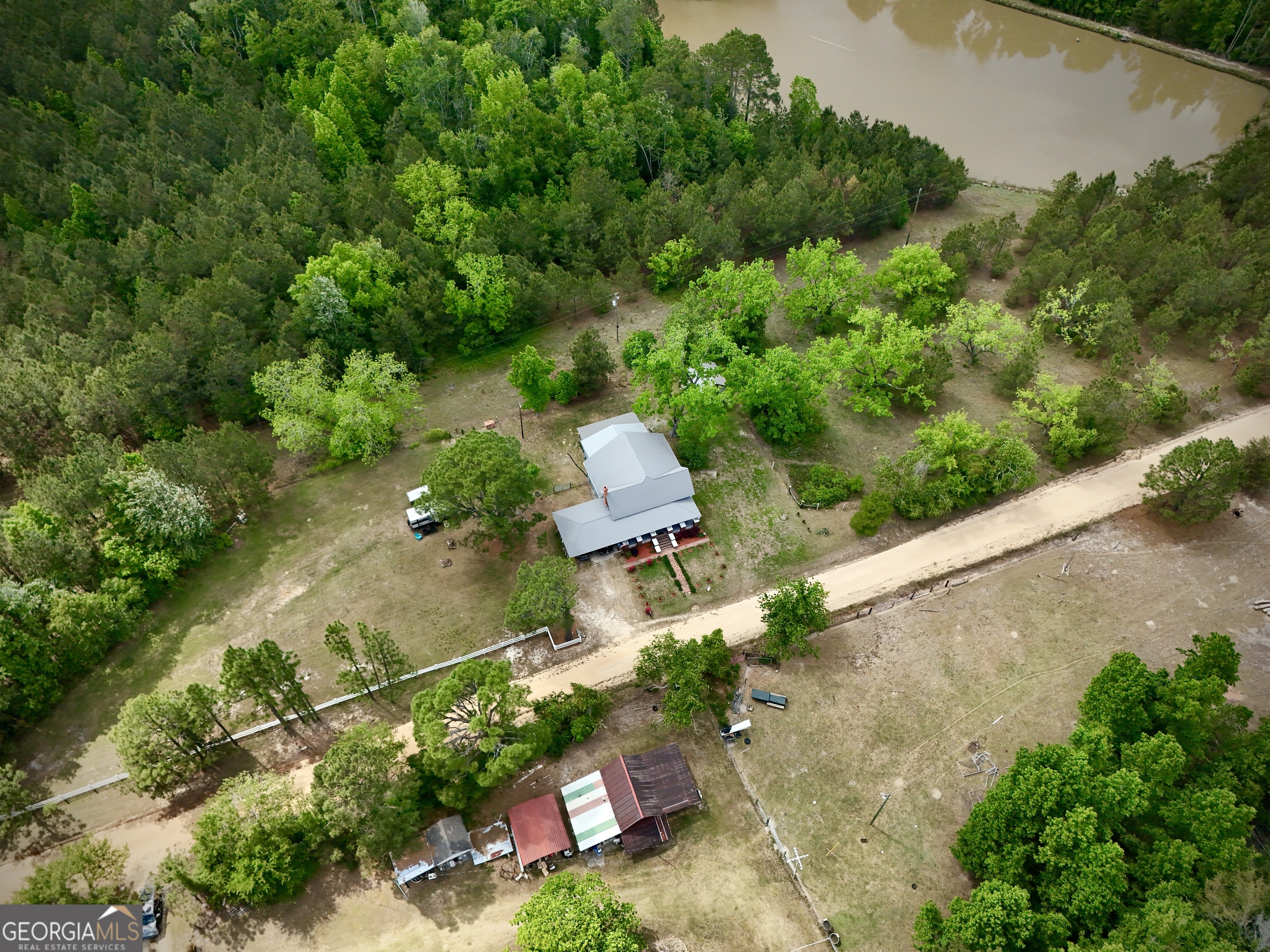 629 Bobby Fortner Road Kite, GA 31049 - Photo 60 of 63 an aerial view of a house with a yard