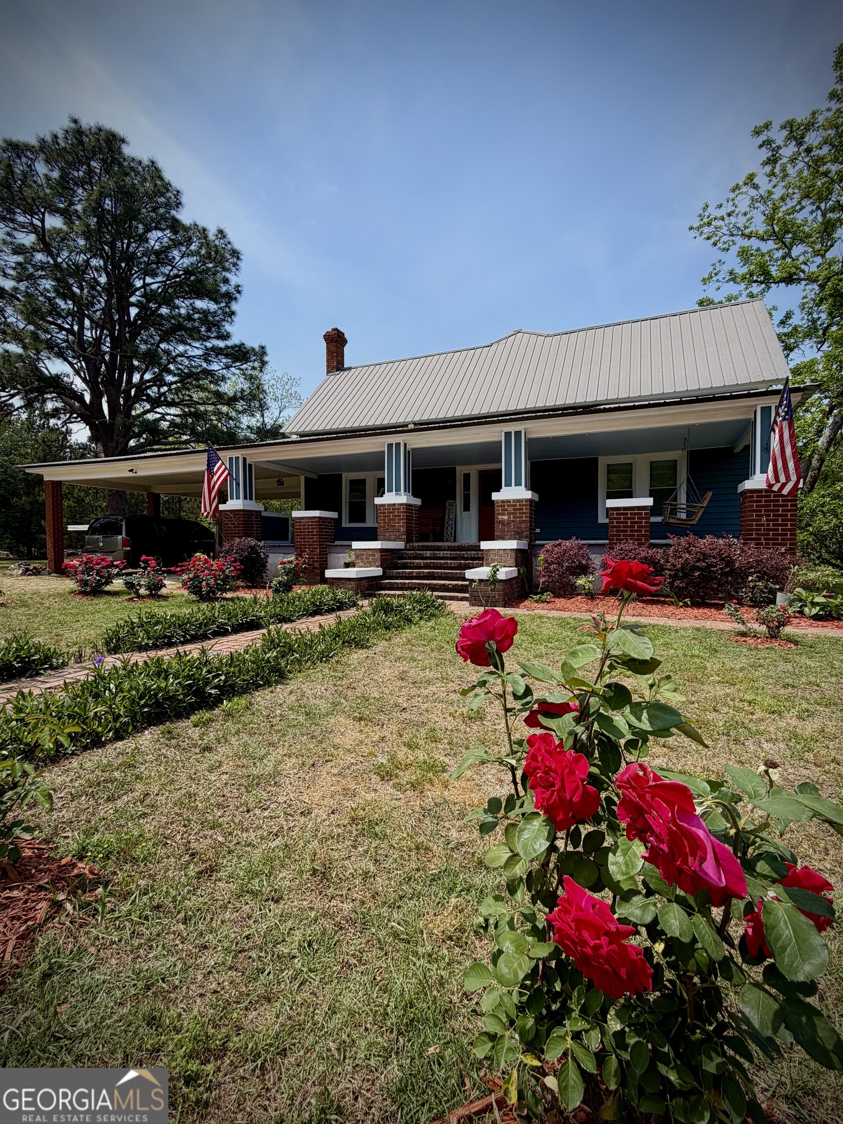 629 Bobby Fortner Road Kite, GA 31049 - Photo 63 of 63 a front view of house with yard and outdoor seating