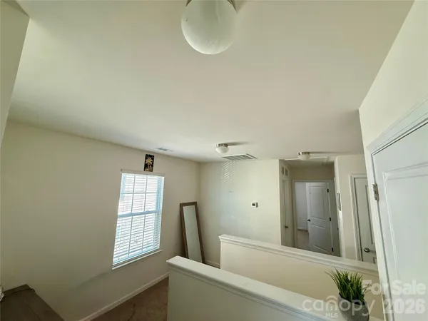 a bathroom with a bathtub and a sink