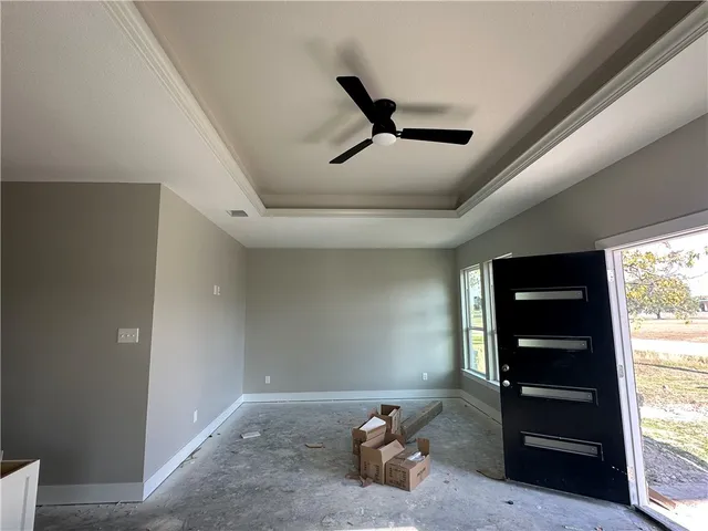 a bed room with a bed and a window