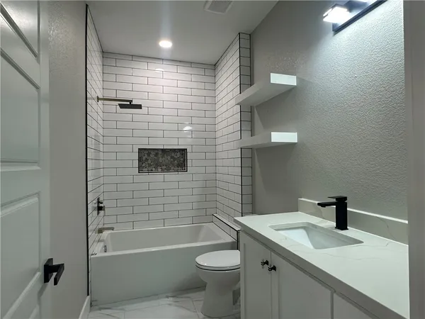 a bathroom with a bathtub