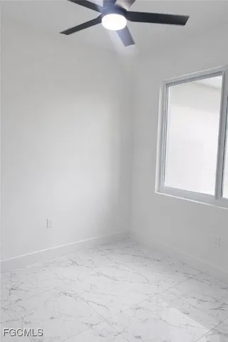 an empty room with closet area