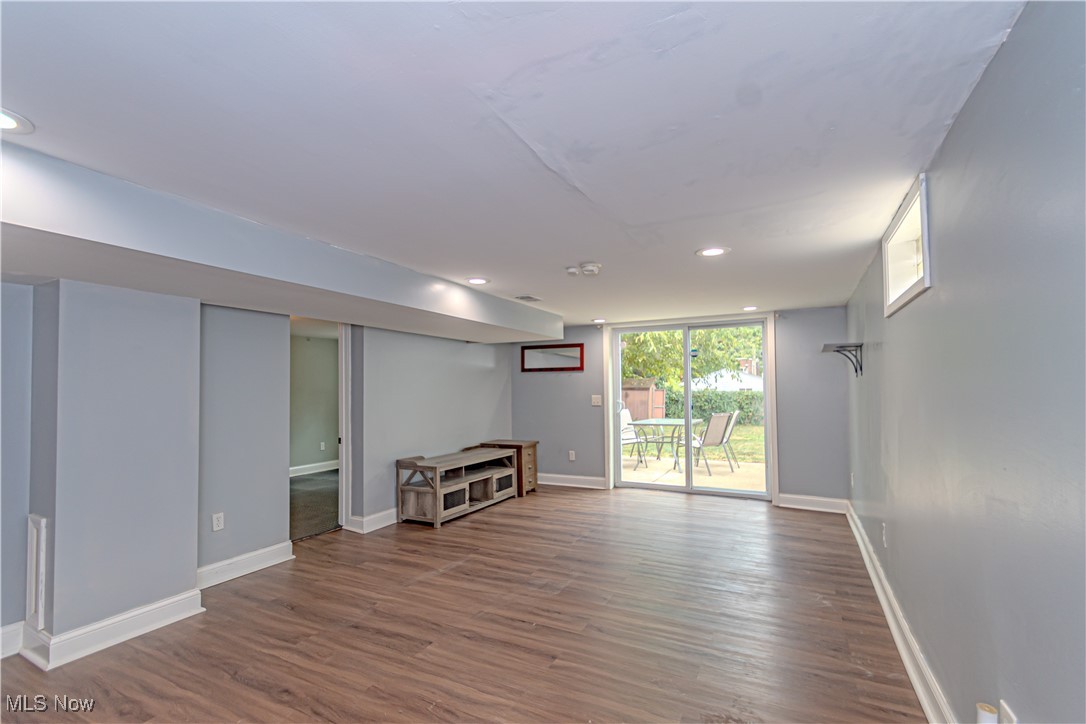 360 Baldwin Road Akron, OH 44312 - Photo 14 of 22 Unfurnished living room featuring wood finished floors and recessed lighting