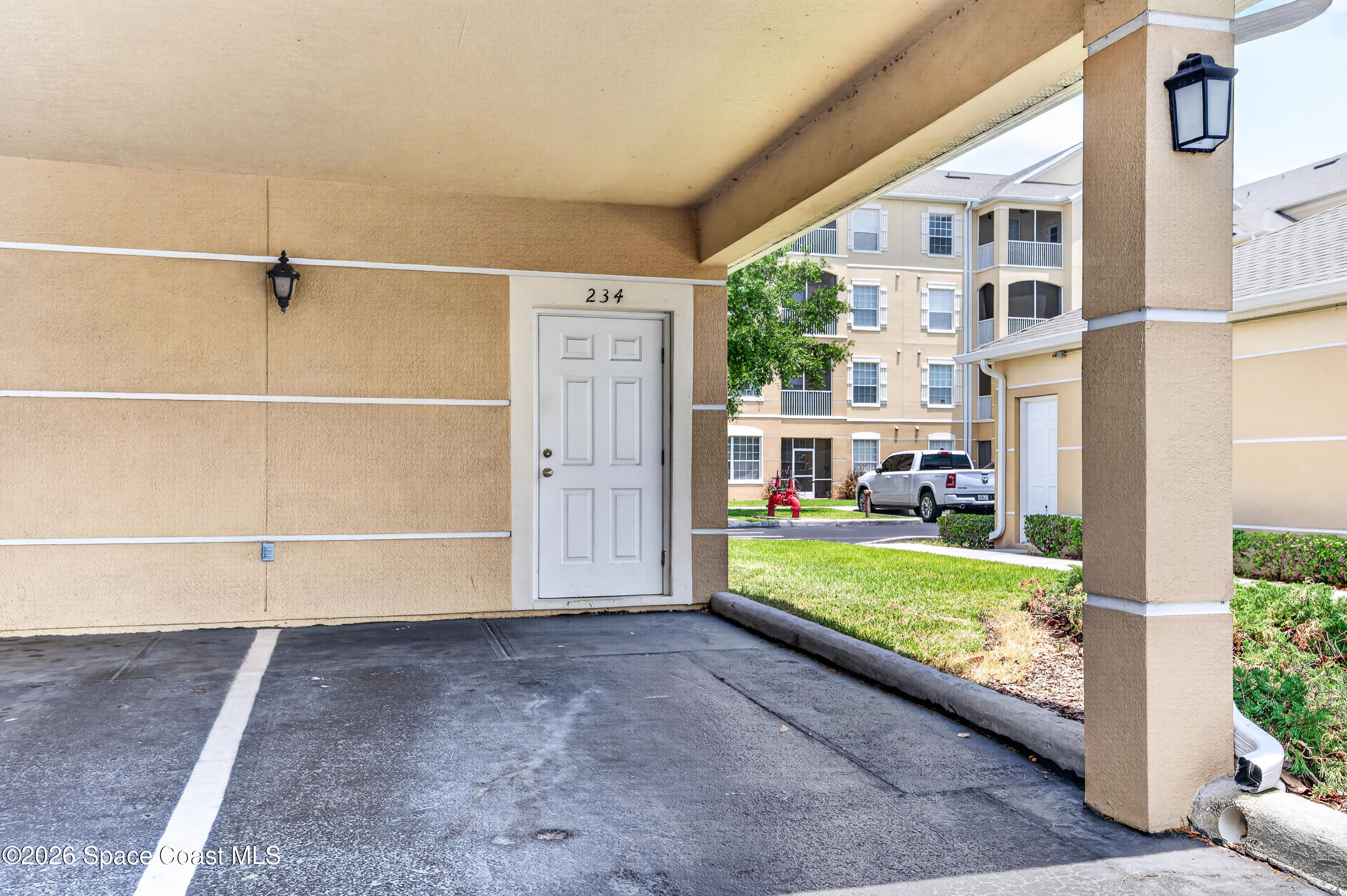 3848 Lexmark Lane, Unit 210 Rockledge, FL 32955 - Photo 33 of 44 end aprking spot