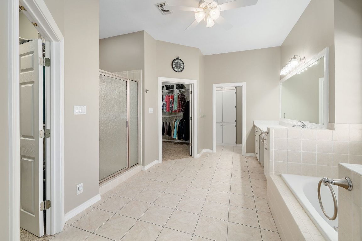 200 High River Ranch Drive Liberty Hill, TX 78642 - Photo 15 of 39 a view of a bathroom from the hallway