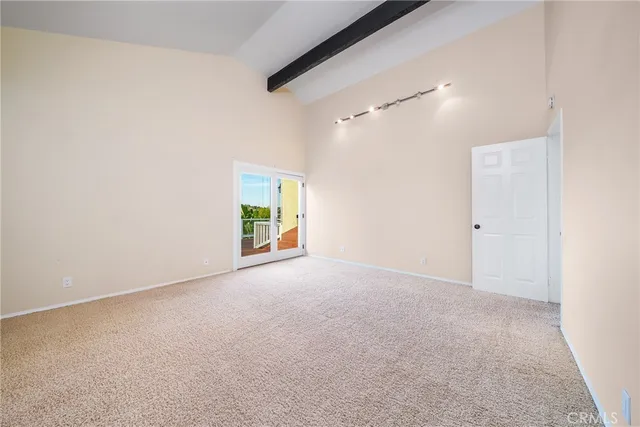 a view of empty room with windows