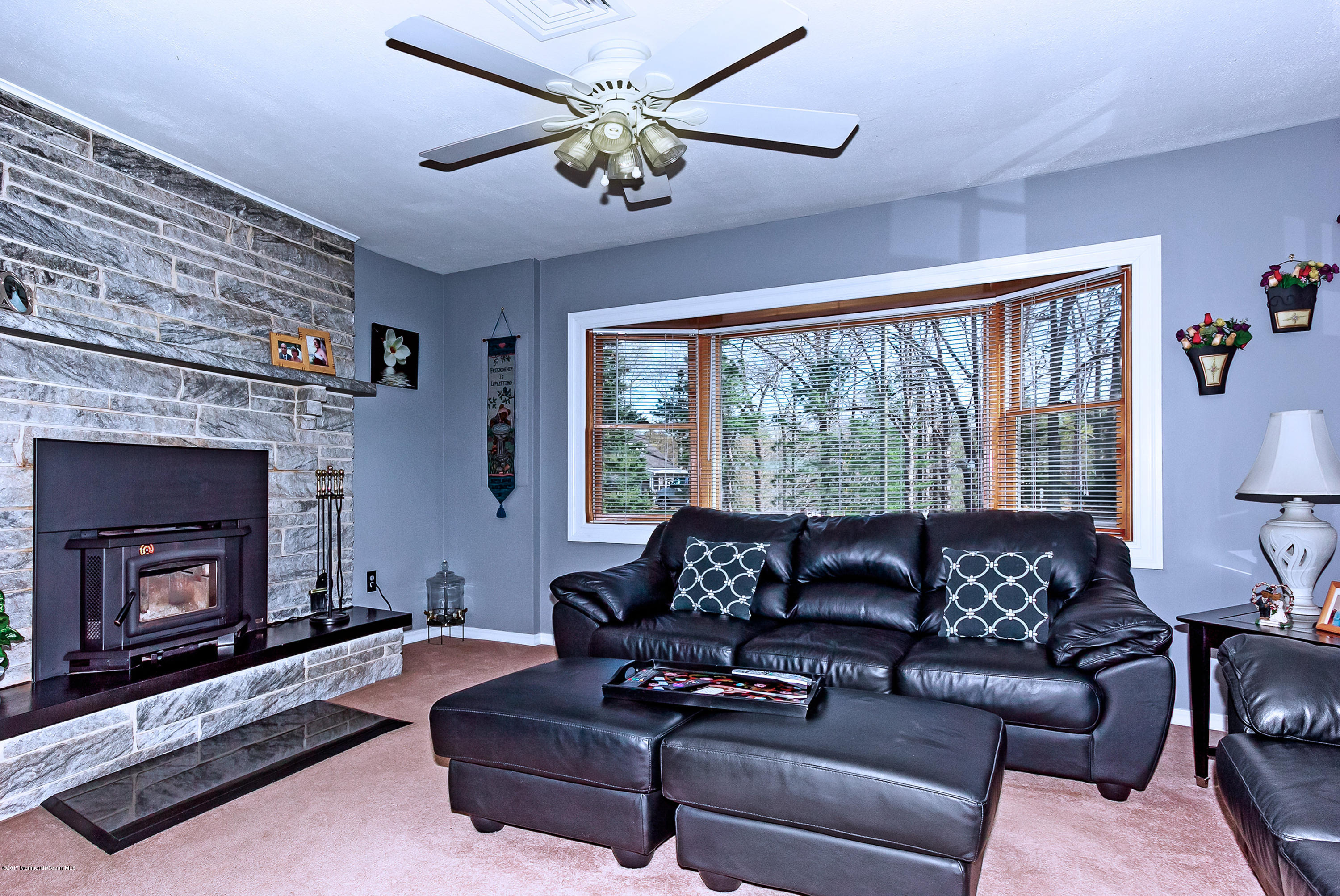95 Siloam Road Freehold, NJ 07728 - Photo 3 of 23 a living room with furniture and a fireplace