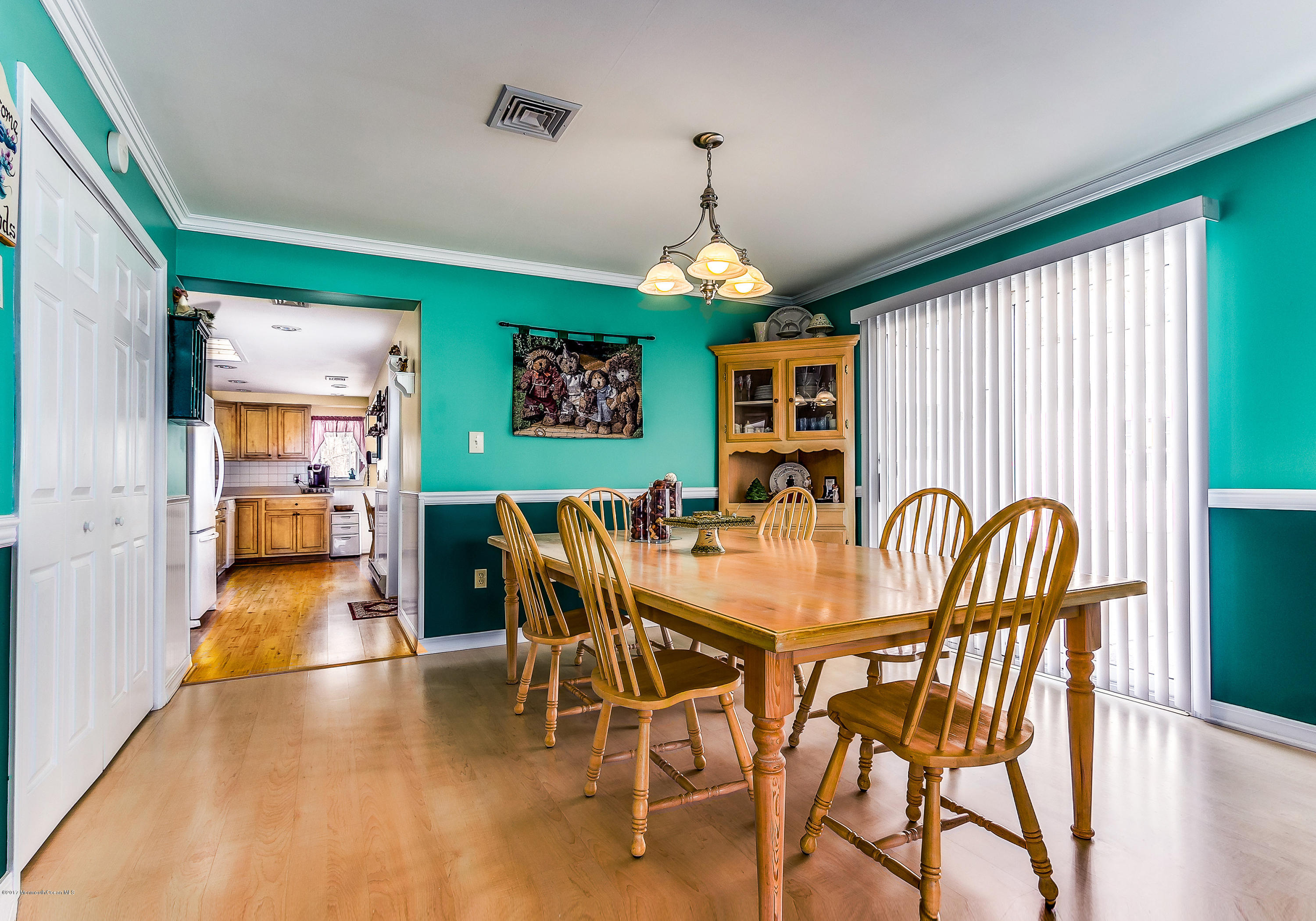 95 Siloam Road Freehold, NJ 07728 - Photo 5 of 23 a view of a dining room with furniture window and wooden floor