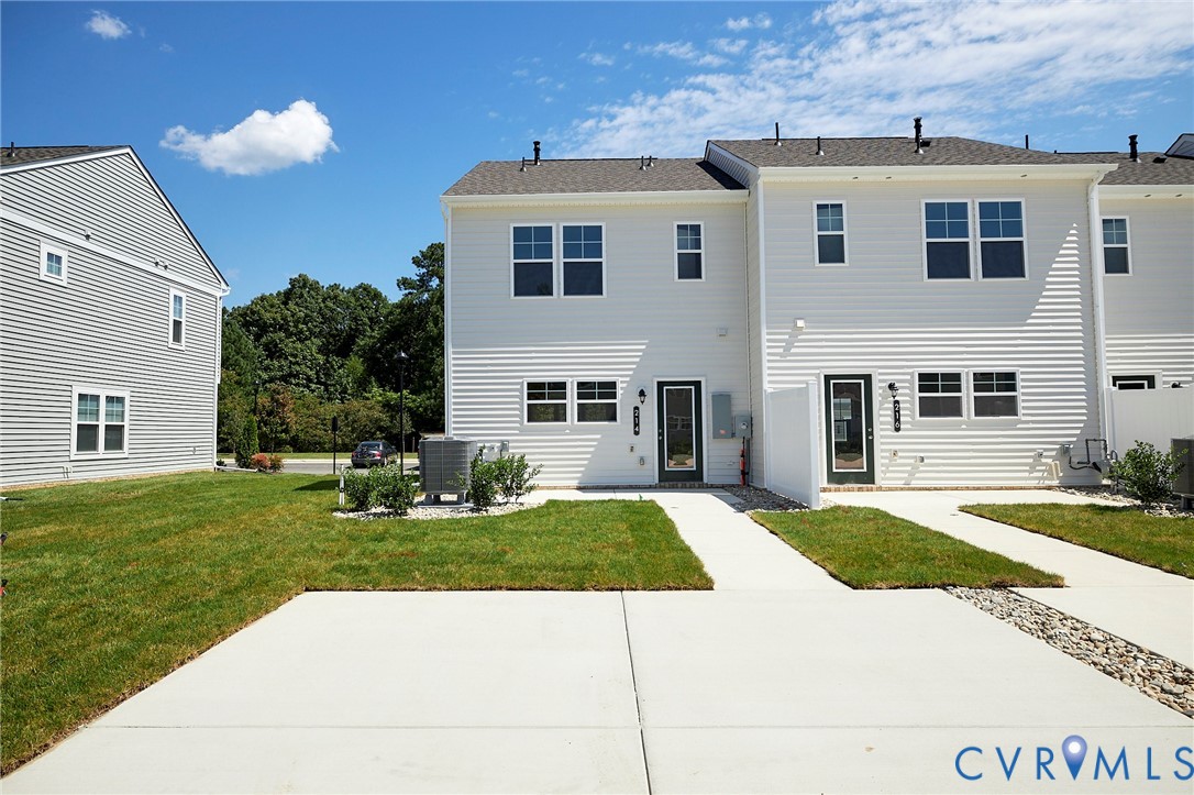214 Greenpark Road Sandston, VA 23150 - Photo 5 of 50 Rear view of property featuring a yard and a patio