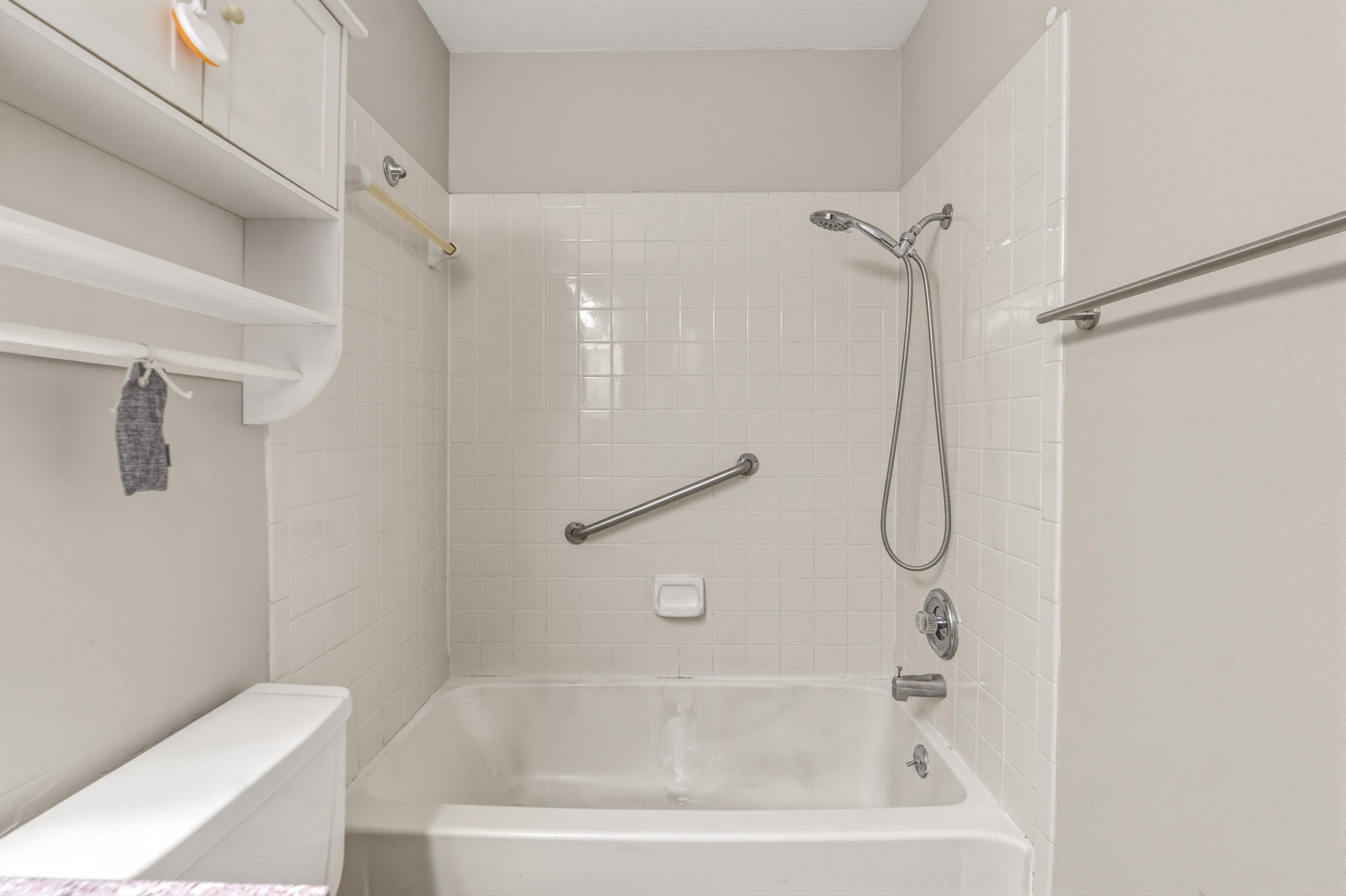 2302 Fuzz Fairway, Unit A Austin, TX 78728 - Photo 18 of 32 a white bath tub sitting next to a white toilet