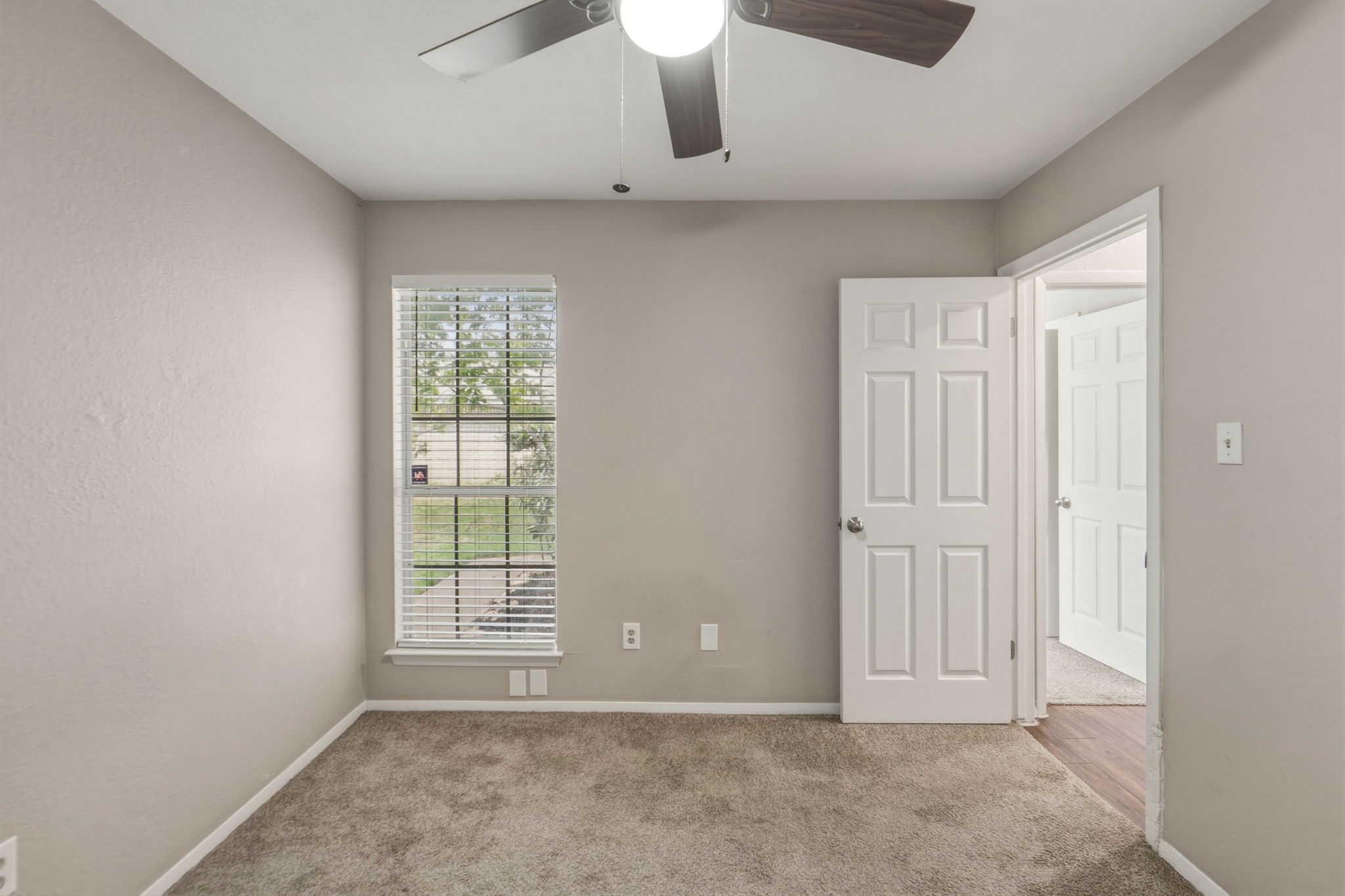 2302 Fuzz Fairway, Unit A Austin, TX 78728 - Photo 23 of 32 an empty room with a window