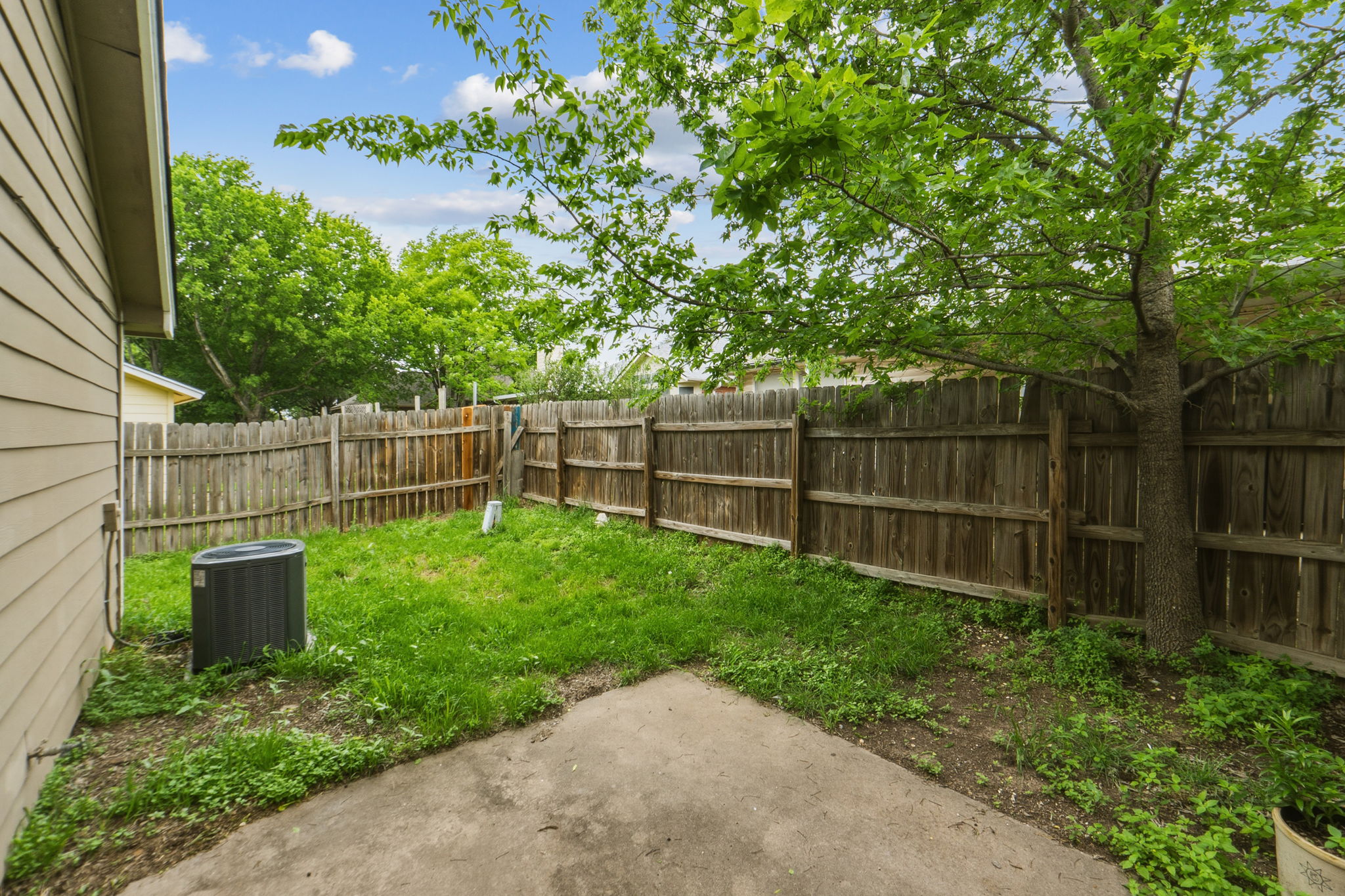 2302 Fuzz Fairway, Unit A Austin, TX 78728 - Photo 26 of 32 a garden view with a pathway