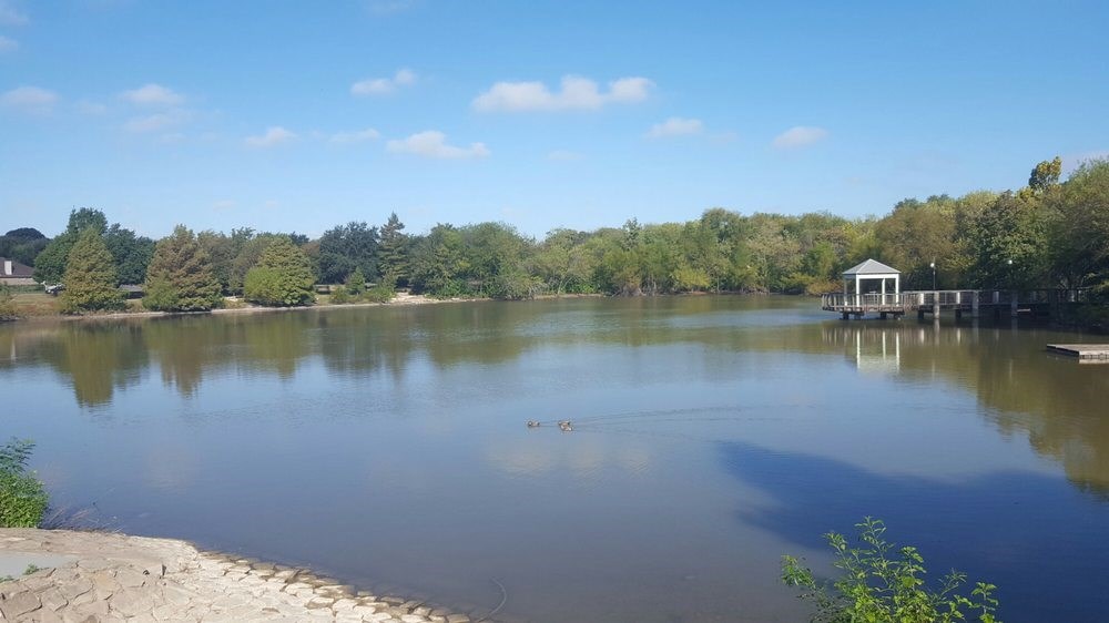 2302 Fuzz Fairway, Unit A Austin, TX 78728 - Photo 30 of 32 a view of a lake with a city