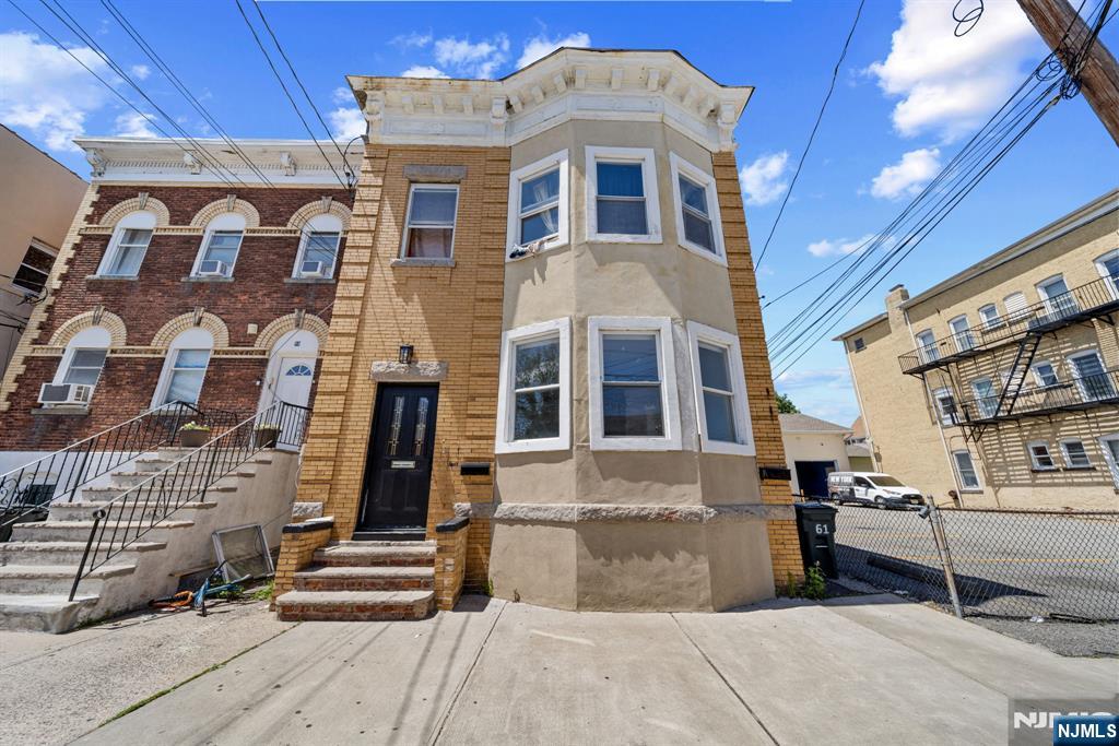 61 Farnham Avenue, Unit 1 Garfield, NJ 07026 - Photo 6 of 14 a front view of a building