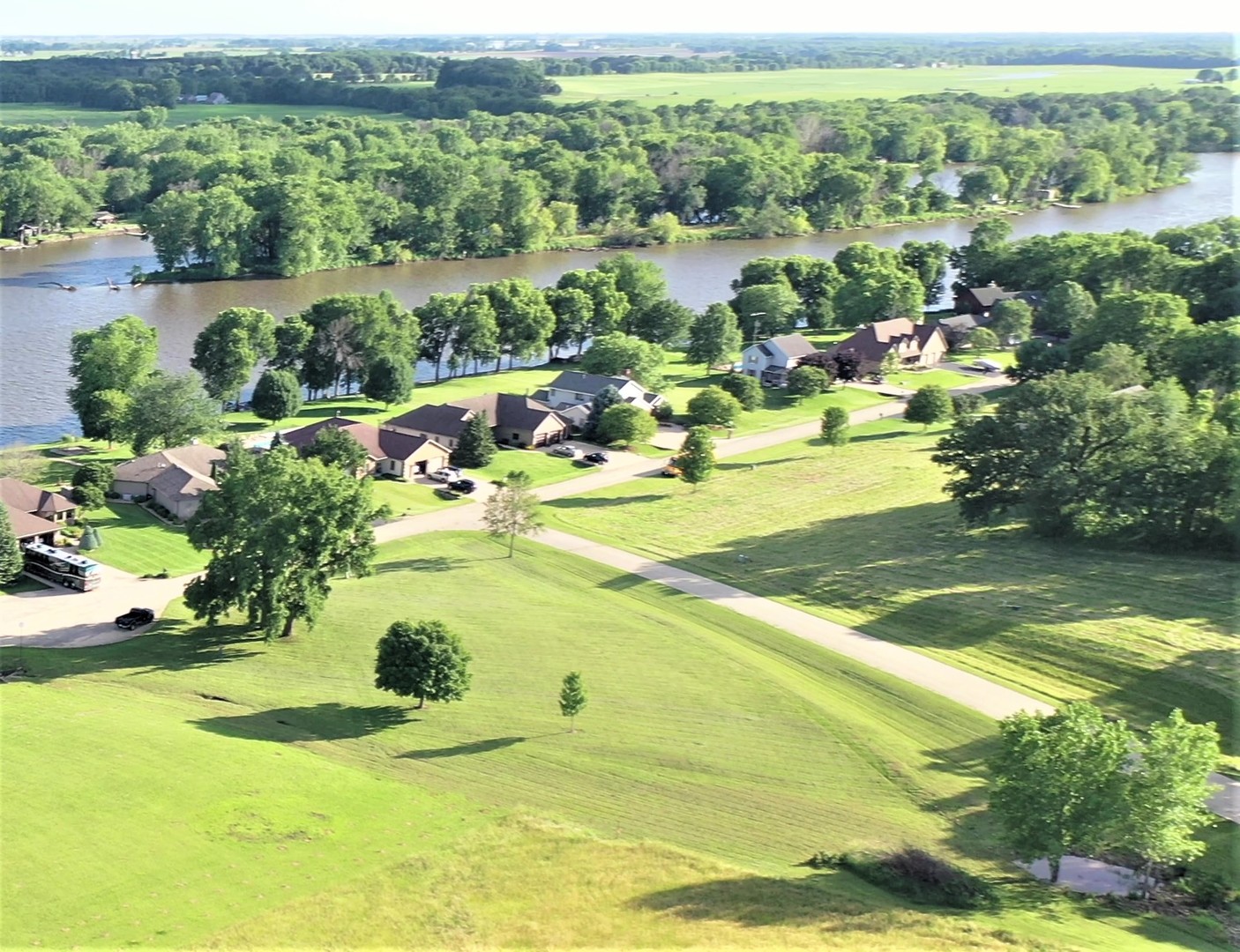 0 Rockside Drive Dixon, IL 61021 - Photo 2 of 6 a view of a lake with a houses