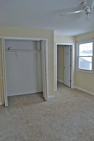a bathroom with a shower and a toilet