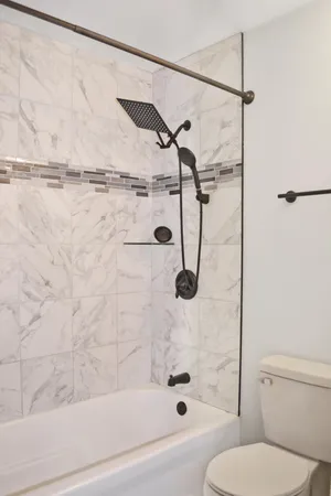 an empty room with a empty space and windows