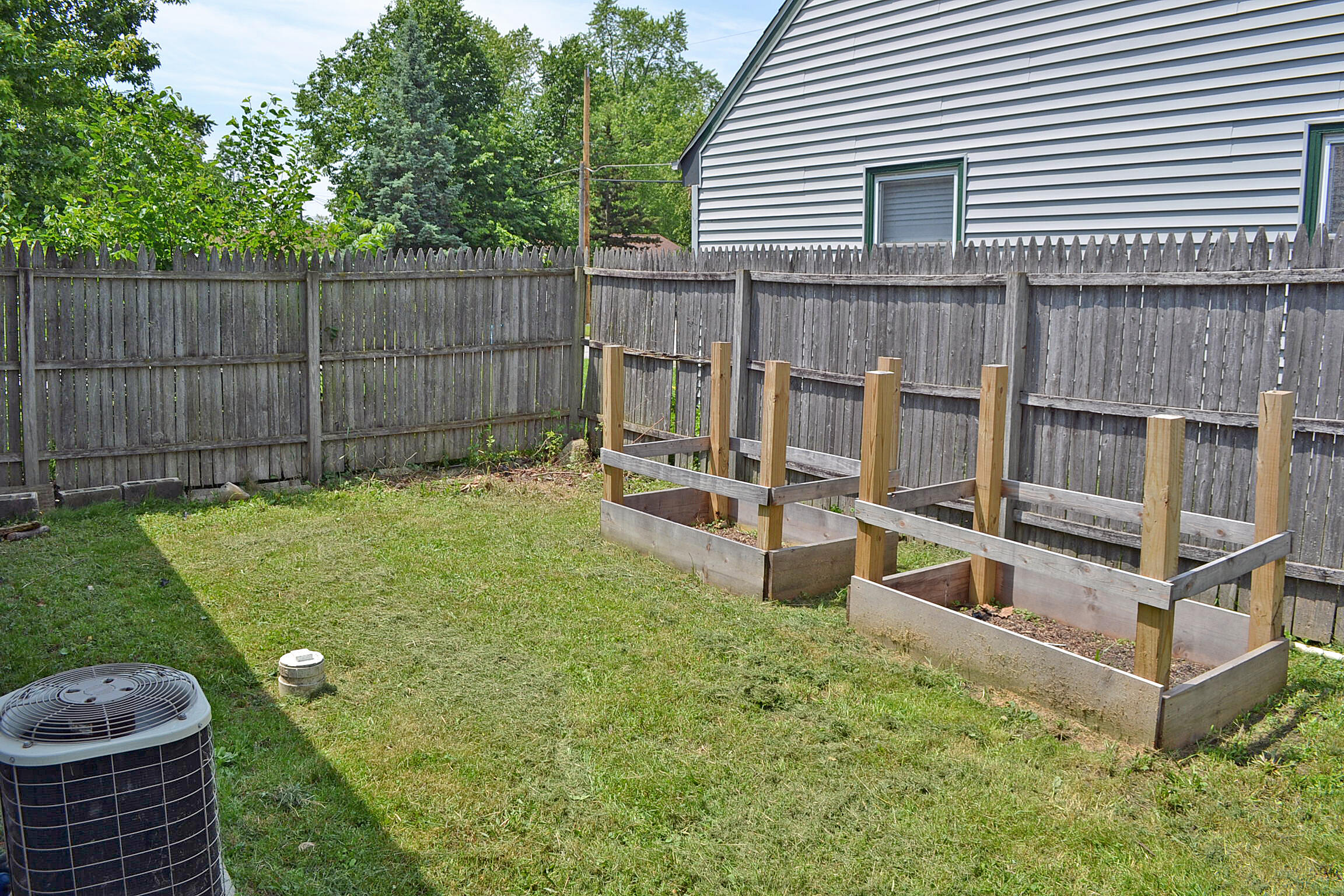 740 Imperial Road Valparaiso, IN 46385 - Photo 29 of 30 a view of a backyard with chairs and a garden