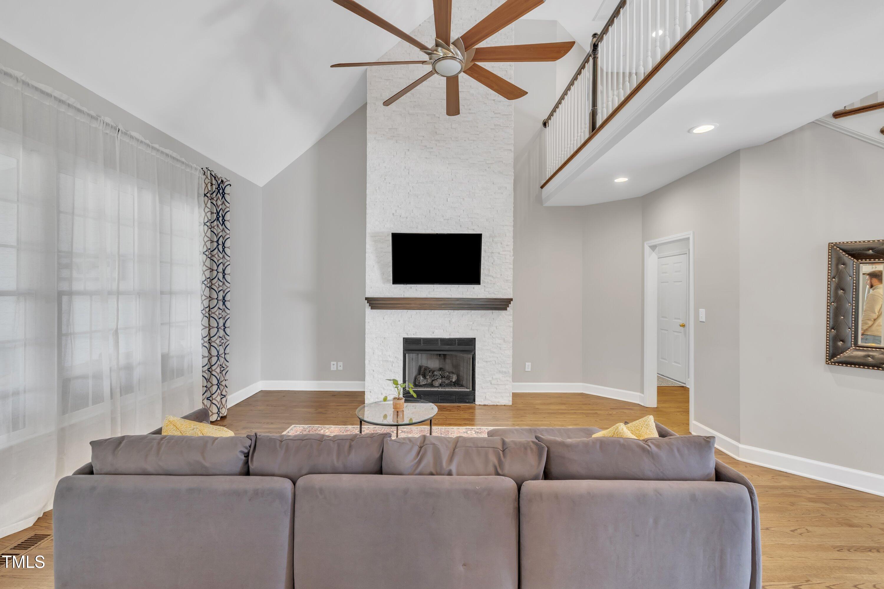 7505 Nichols Road Raleigh, NC 27615 - Photo 10 of 45 Beautiful 2-story stone gas fireplace