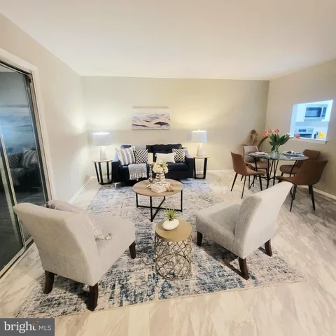 a living room with furniture and a couch